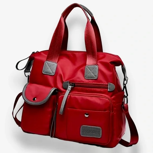 Sweet heaven! It a large, fashionable NYLON bag with lots of compartments! - Picture 2 of 6